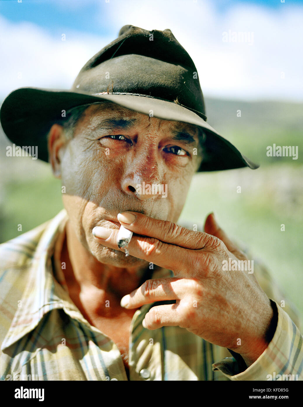USA, Hawaii, The Big Island, Waimea, close-up of a Paniolo cowboy smoking cigarette at the Parker Ranch Stock Photo