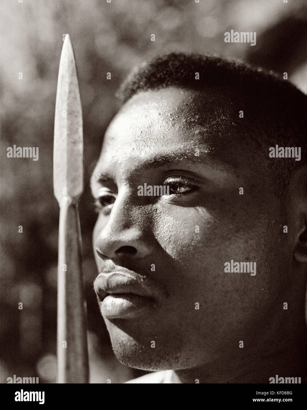 MADAGASCAR, mid adult man holding spear, close-up, Beza Mahafaly (B&W) Stock Photo