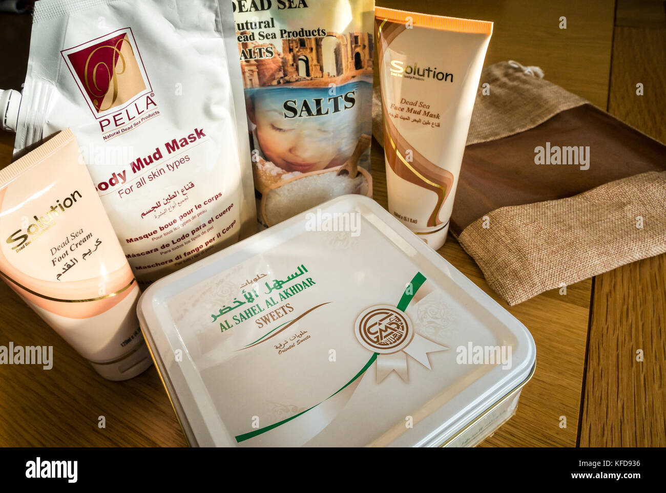 Holiday souvenirs. Cosmetic products from Dead Sea, Jordan, including bath  salts, foot cream, body mud mask, face mud mask and honey sweets in tin  Stock Photo - Alamy