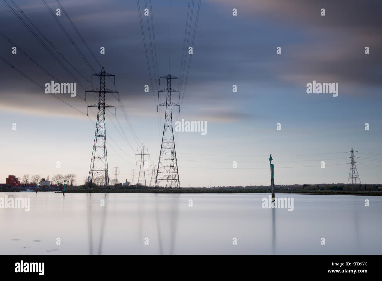 Electric pylons in the landscape with motion blur Stock Photo - Alamy