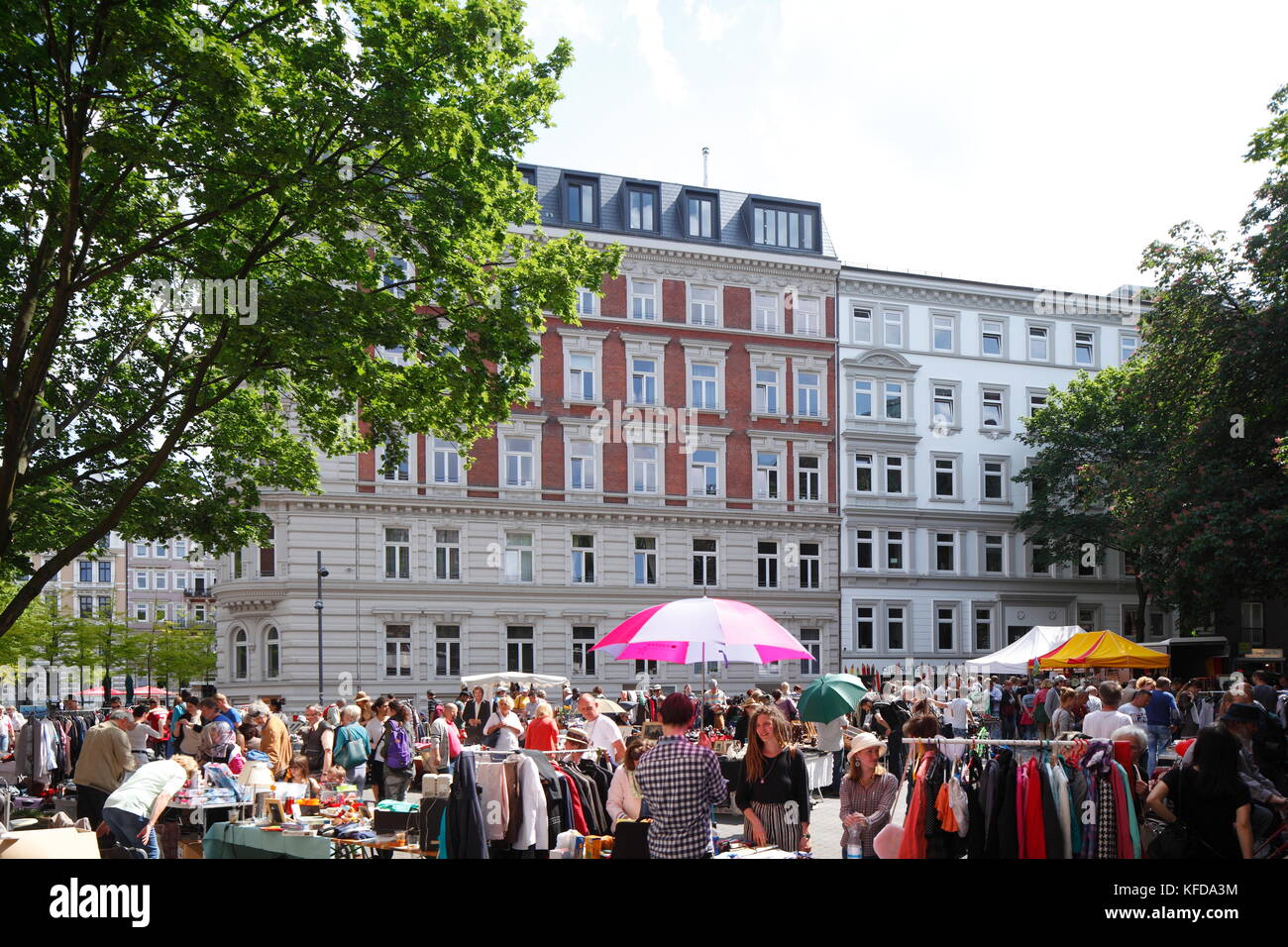 Flea Market and old residential building at Hansaplatz Square in St. Hamburg, Germany