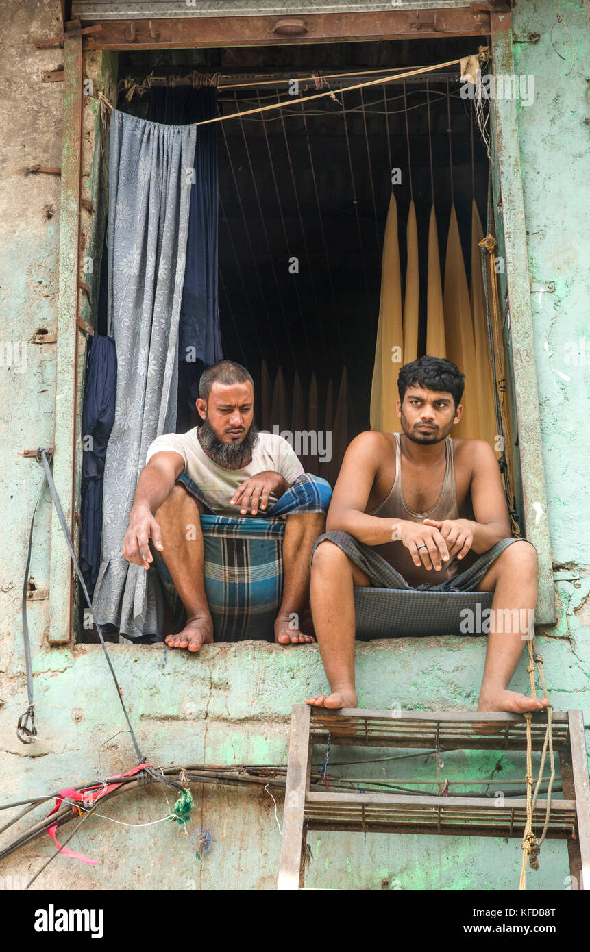 Men in Dharavi slum, Mumbai, India Stock Photo