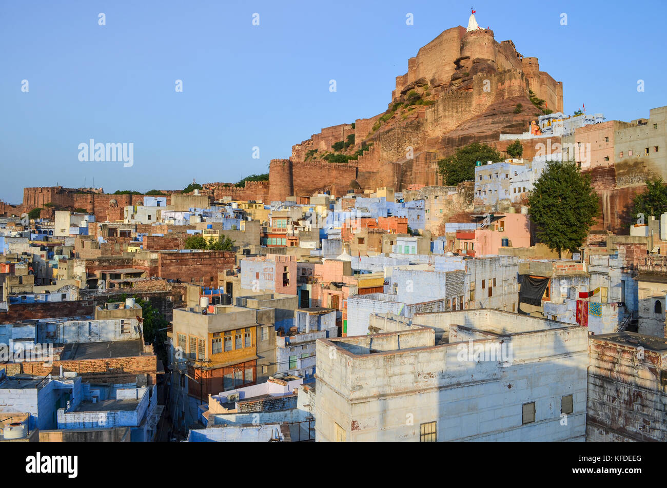 Cityscape of Jodphur with traditional indigo blue and white painted houses and the 15th century Mehrangarh Fortress on the hilltop. Stock Photo