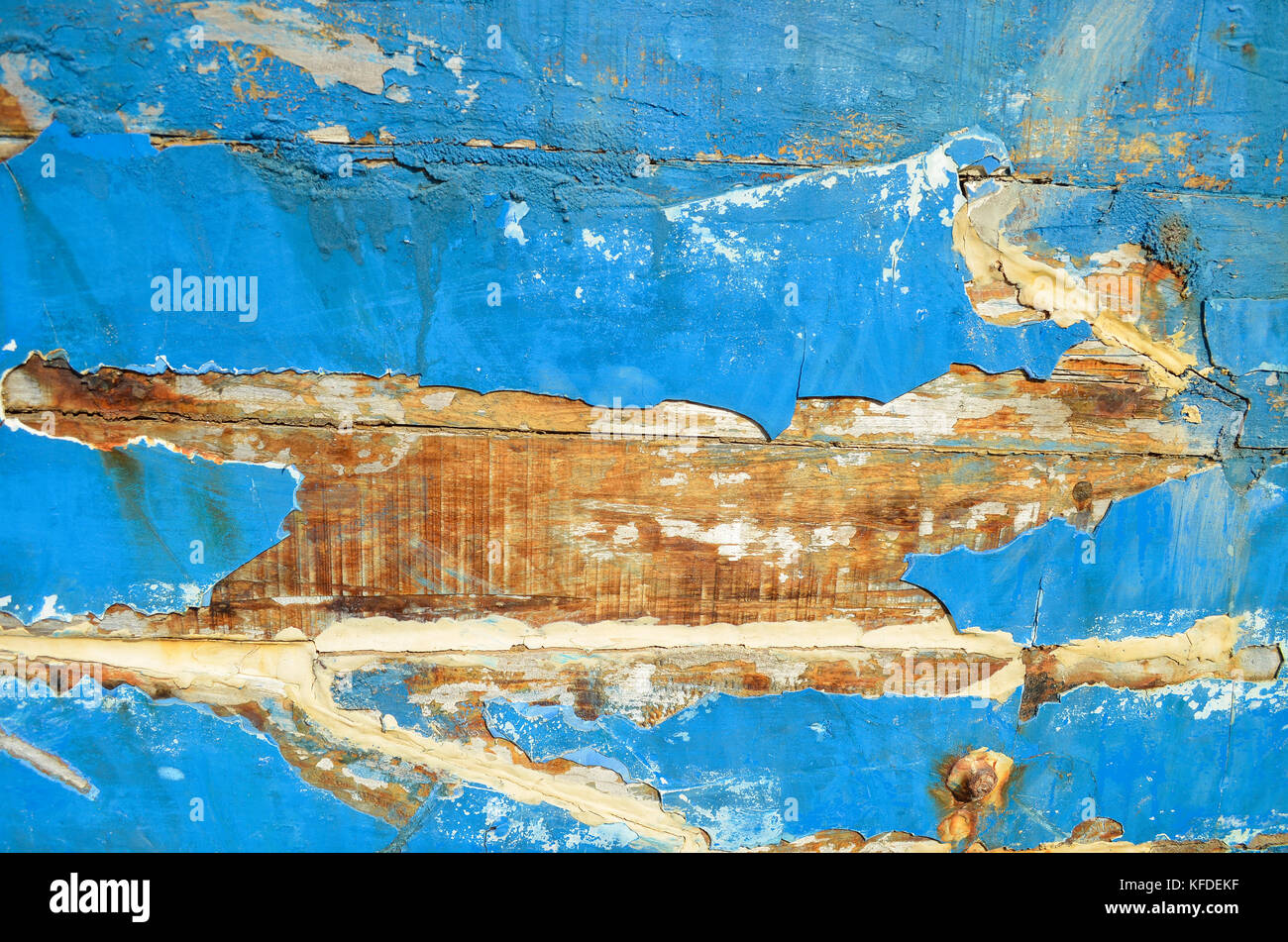 Close up of peeling blue paint and the woodwork on a boat's hull Stock Photo Alamy