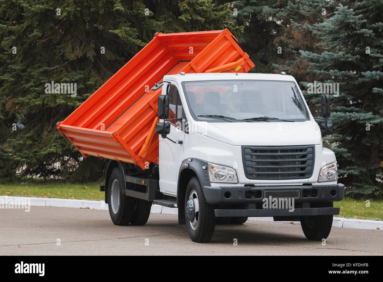 Small dump truck with red body Stock Photo Alamy