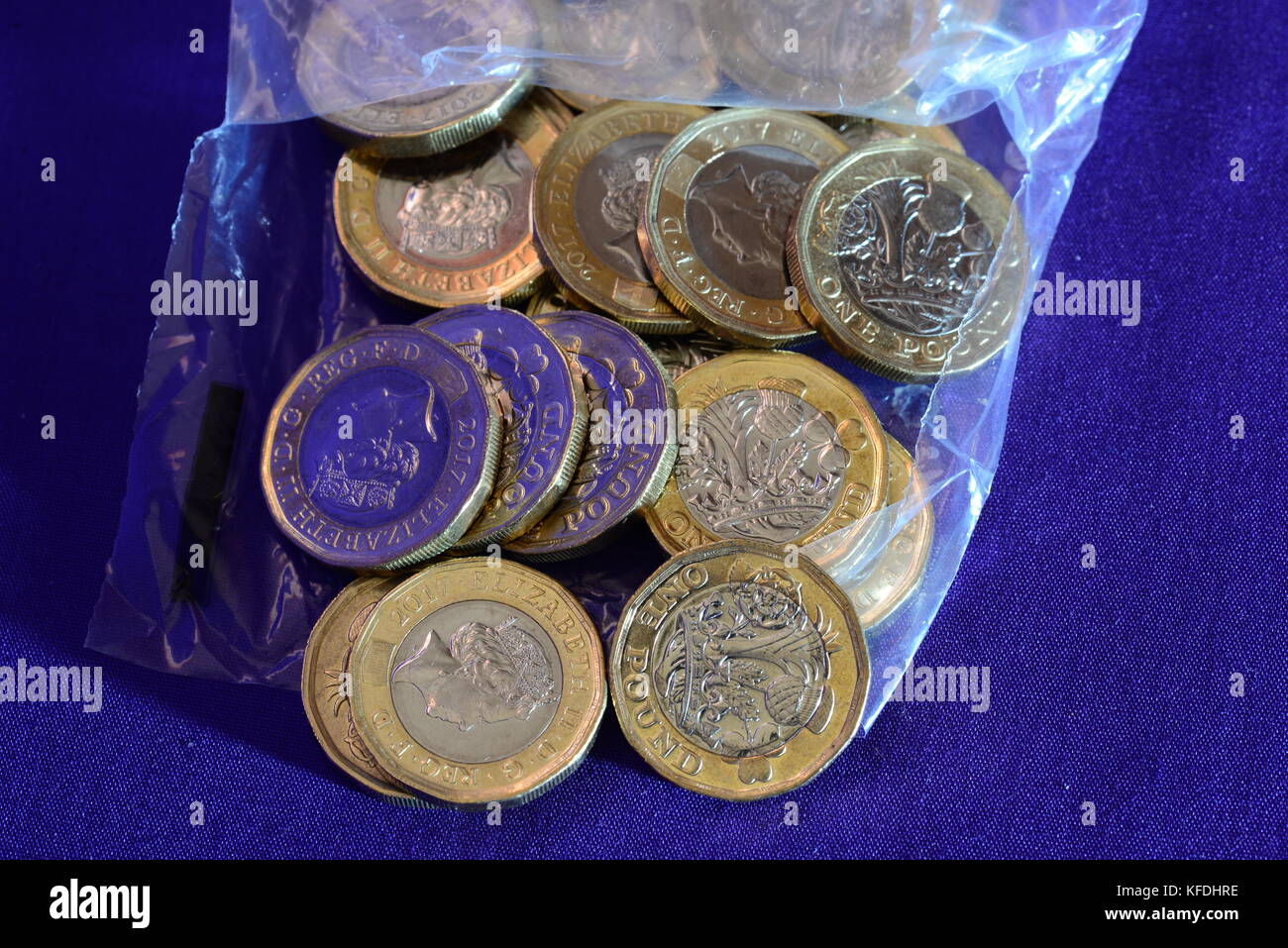Pound coins in bank bags Stock Photo Alamy