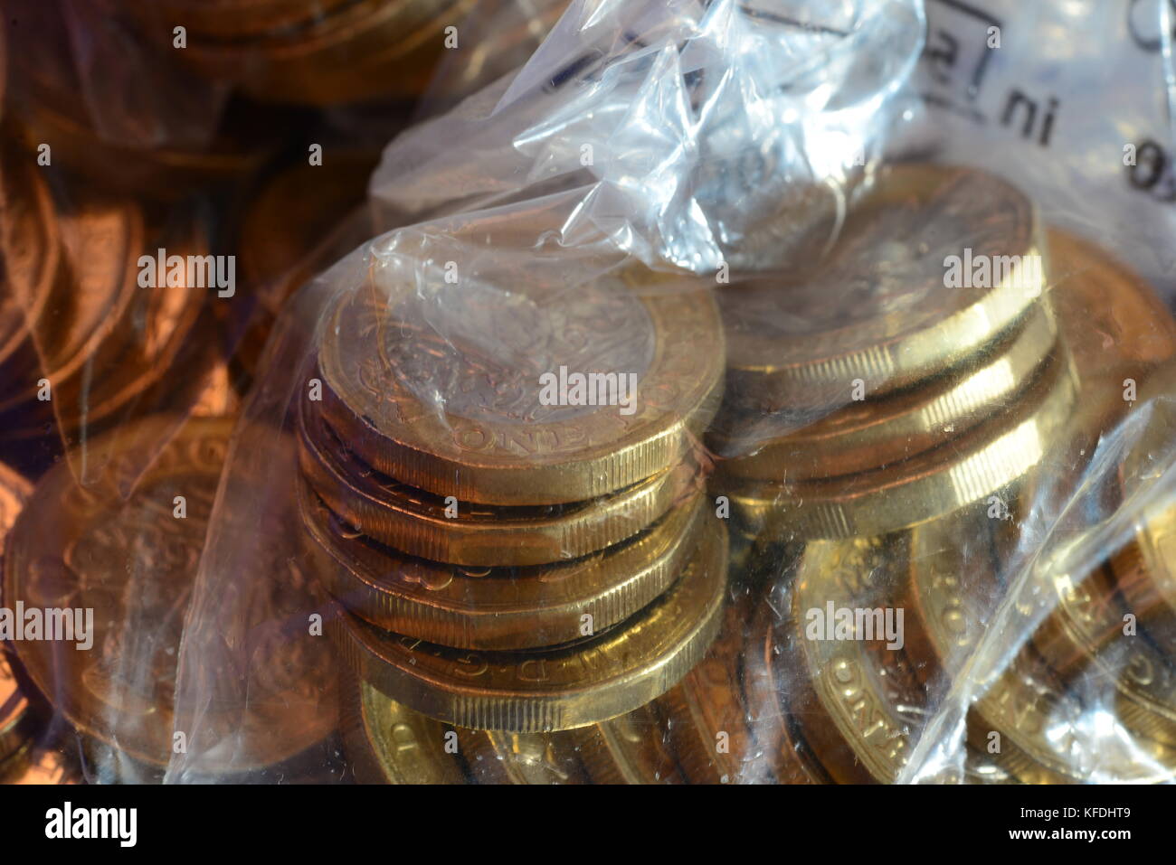Pound coins in bank bags Stock Photo Alamy