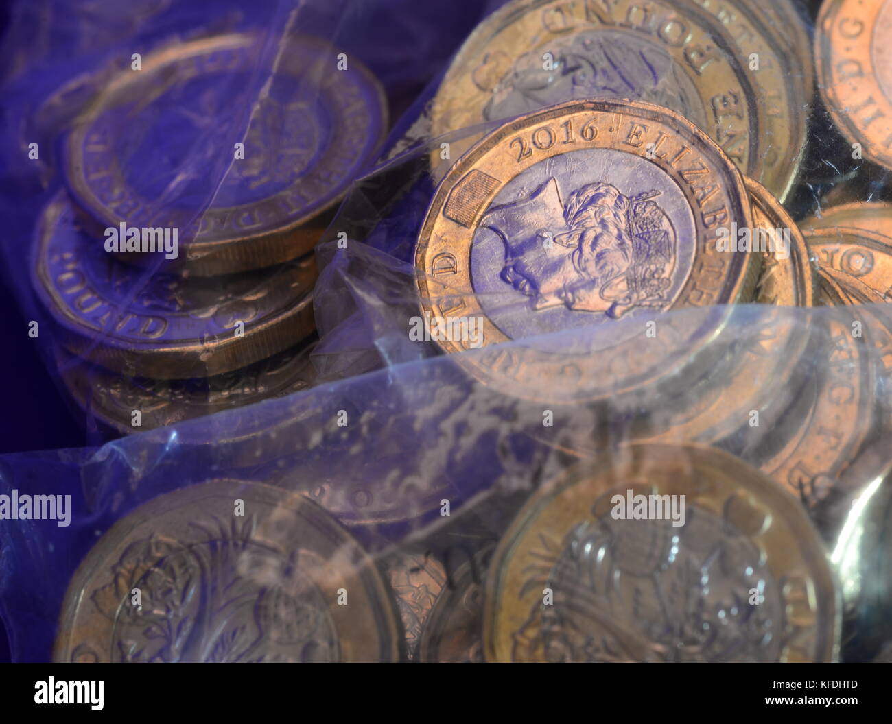 Pound coins in bank bags Stock Photo Alamy