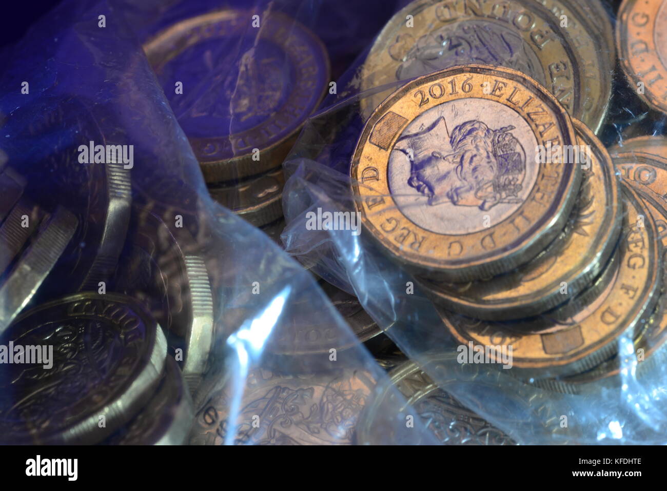 Pound coins in bank bags Stock Photo Alamy