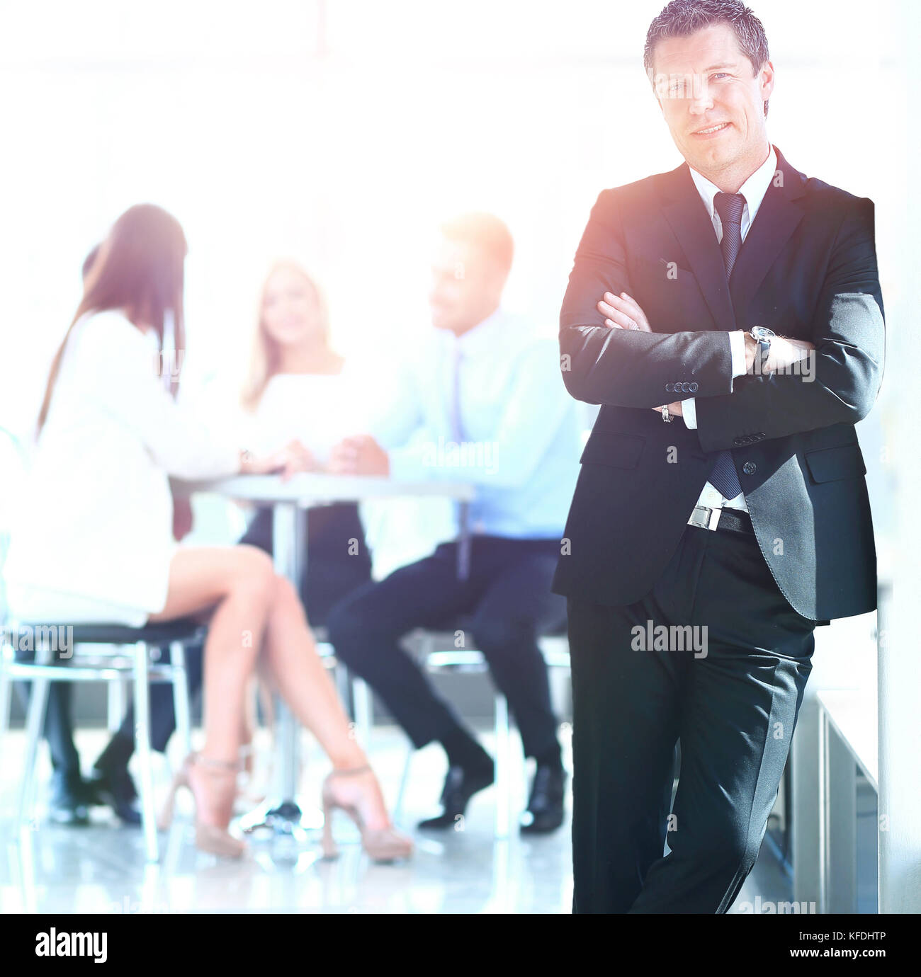 businessman standing with his team Stock Photo - Alamy