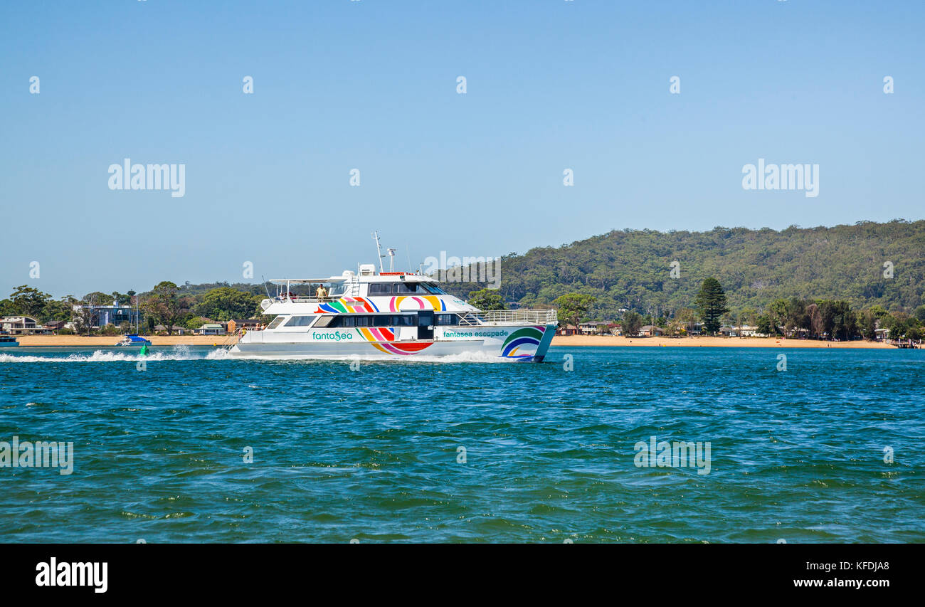 Australia, New South Wales, Central Coast, catamaran ferry to Palm Beach passing Ettalong Beach Stock Photo