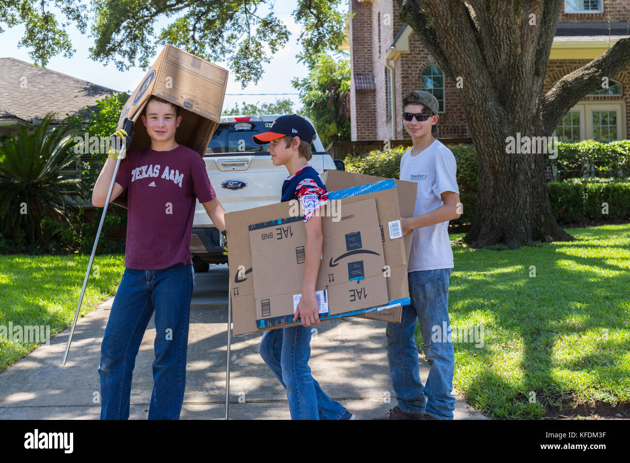 Cleanup begins in Houston after hurricane Harvey and heavy floods. A group of Houston young residents participate in cleanup efforts Stock Photo