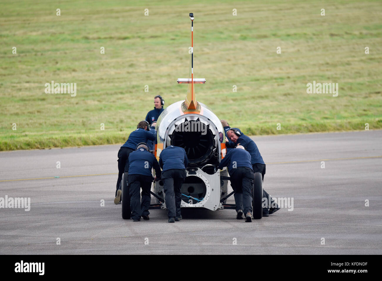 Crew pushing Bloodhound SSC supersonic car during testing at Cornwall Airport Newquay Stock Photo