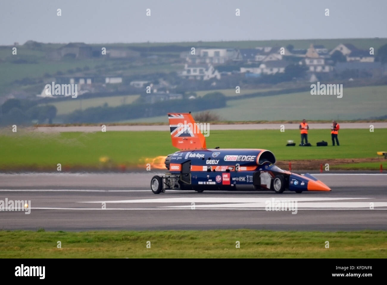 Bloodhound SSC supersonic car at speed with re-heat afterburner engaged from the Eurojet EJ200 jet engine during trials at Cornwall Airport Newquay Stock Photo