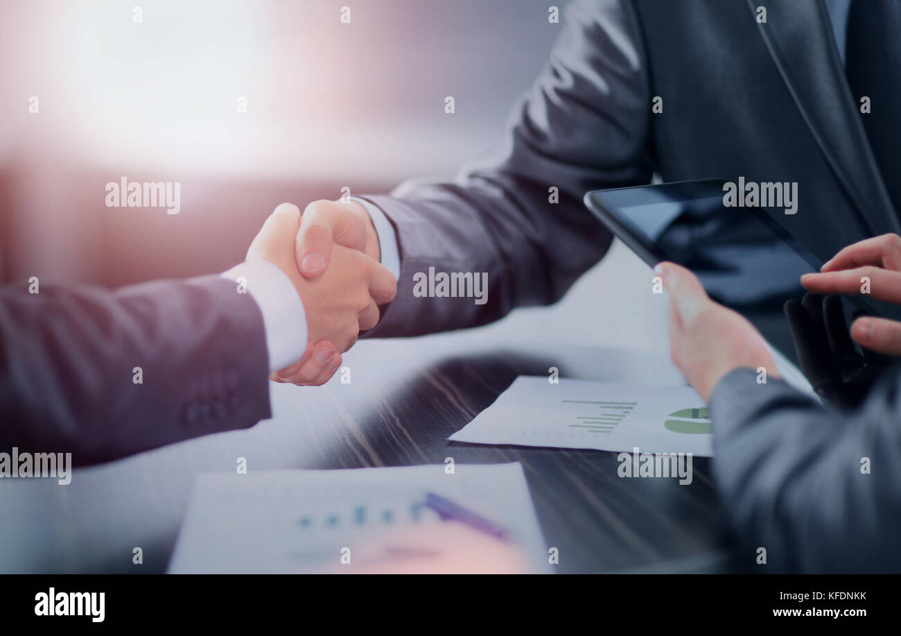 Business people shaking hands in office Stock Photo - Alamy