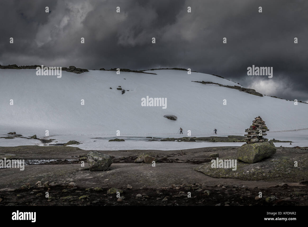 Hiking in Trolltunga Norway Stock Photo