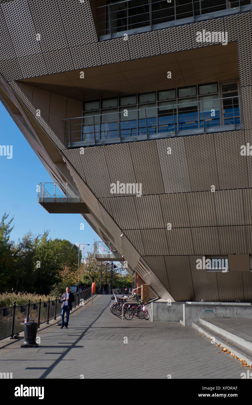 Library and waterfront with new housing construction and views of the ...