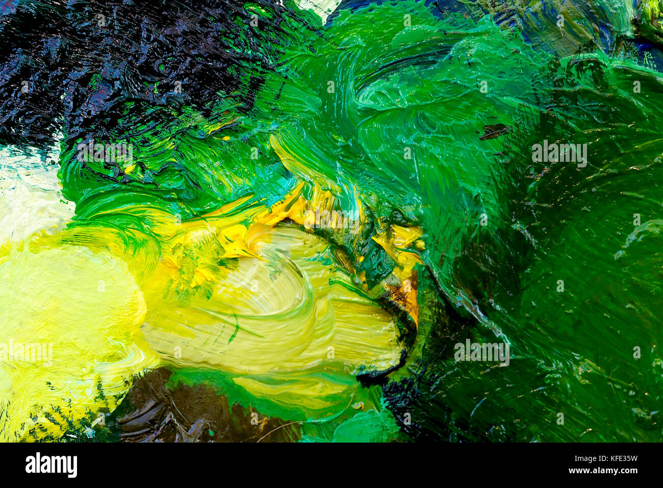 Detail of artist palette, color tones mixed together Stock Photo Alamy