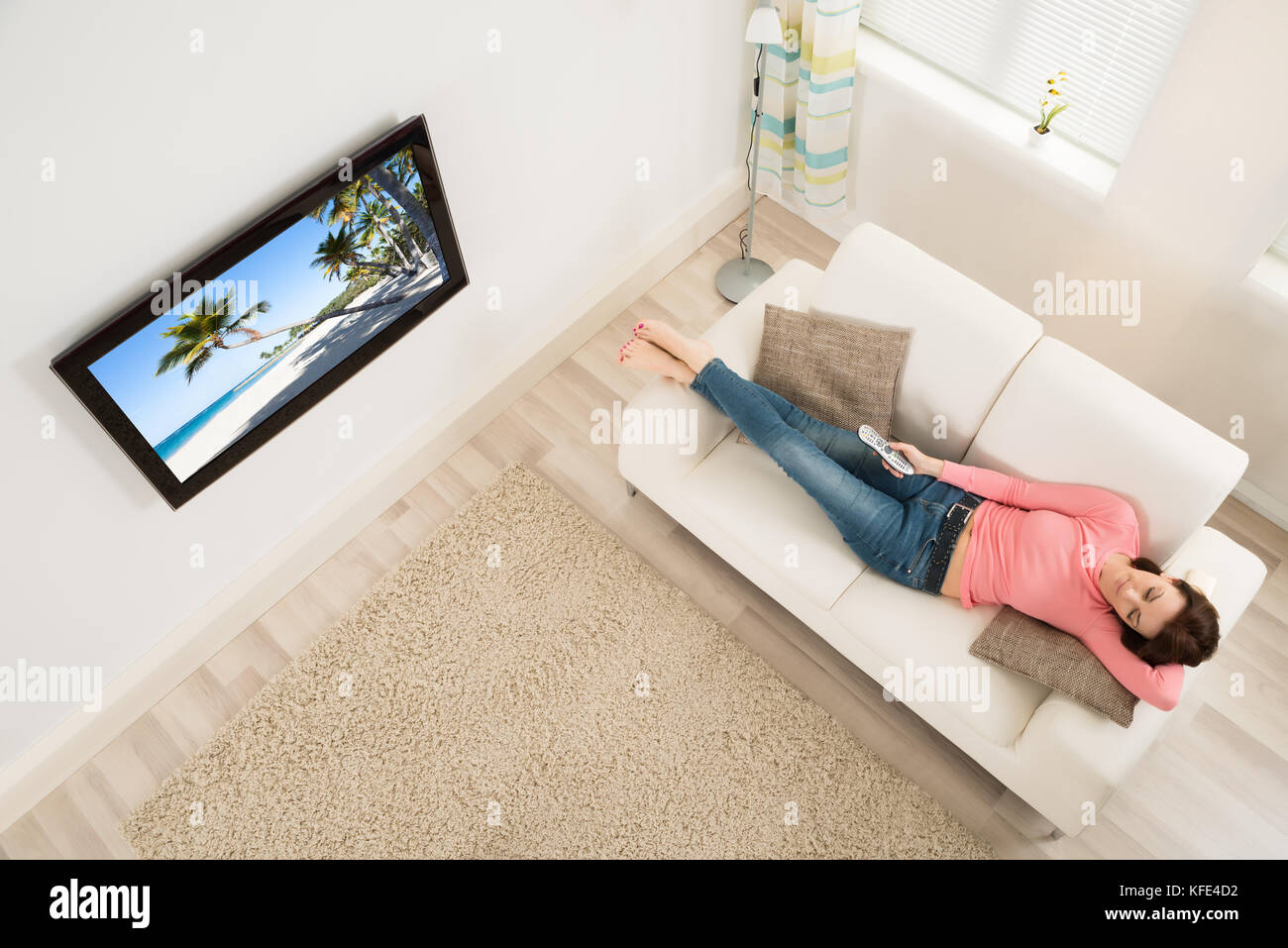 Falling asleep watching tv hires stock photography and images Alamy