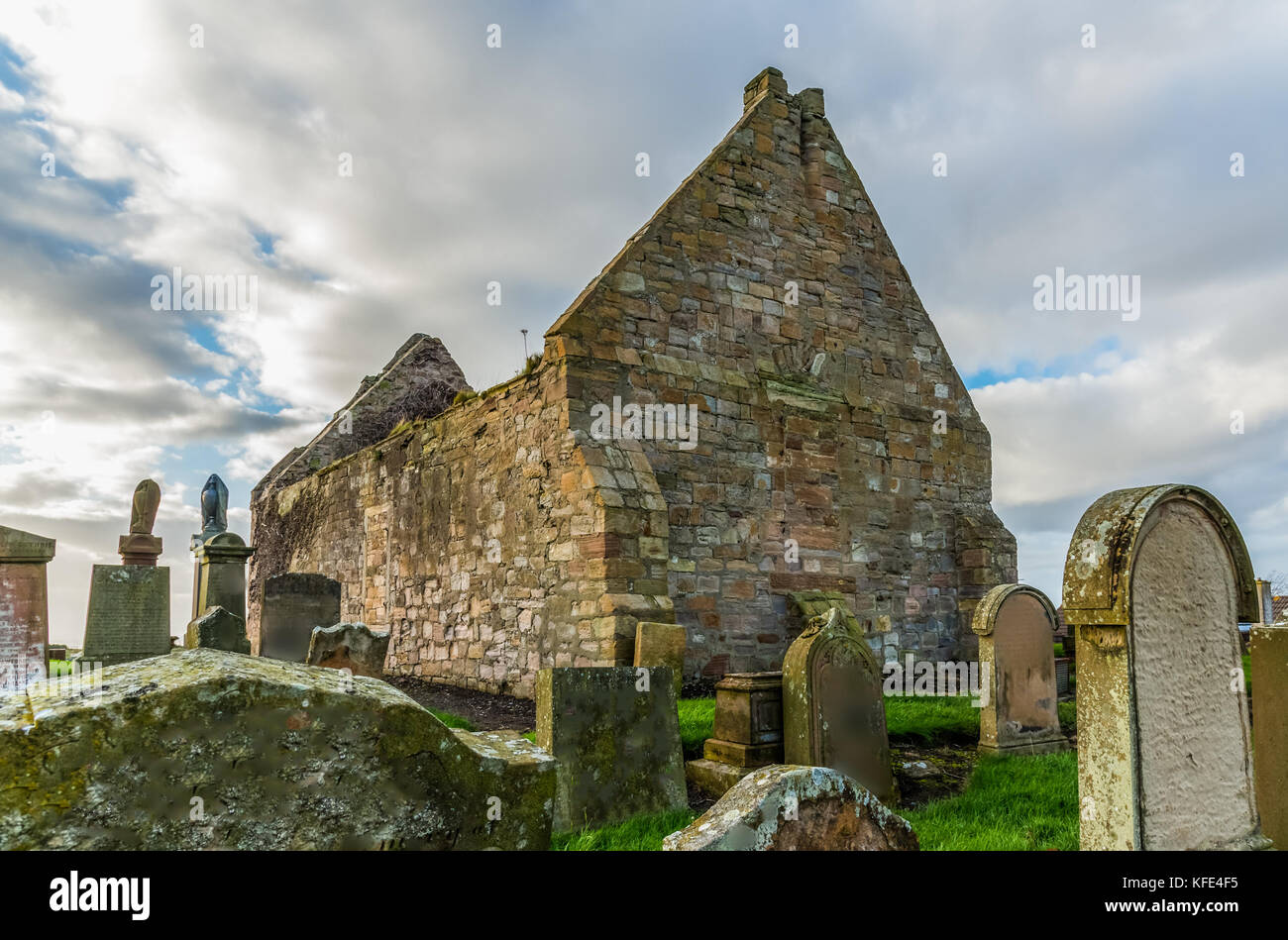 The Old Ruins of Prestwick Old Parish Church & Graveyard. Dedicated to St Nicholas surrounded by an old burial ground. In the church yard are the grav Stock Photo
