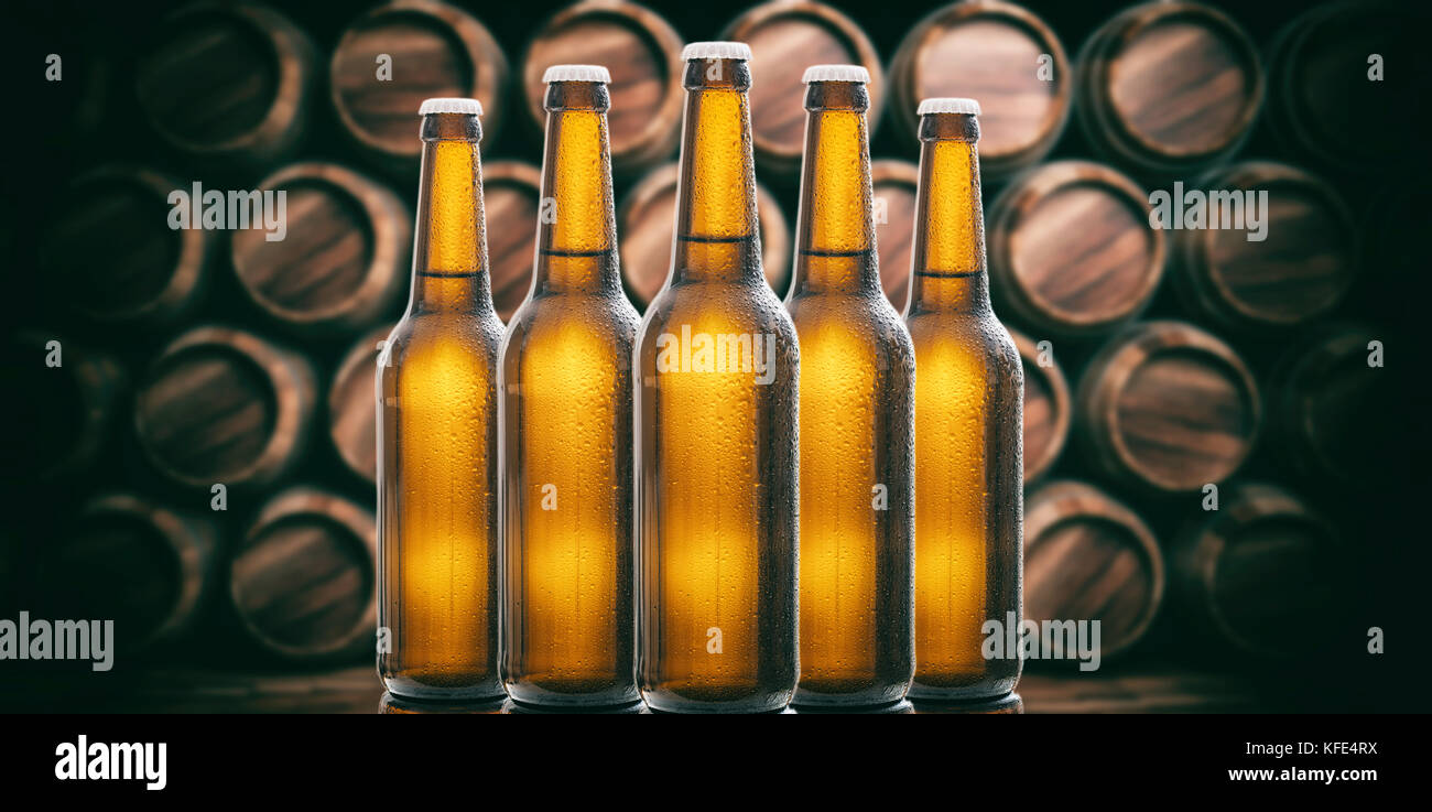 Set of unopened beer bottles in a brewery, wooden barrels background
