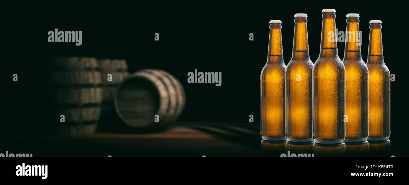 Set of unopened beer bottles in a brewery, wooden barrels background
