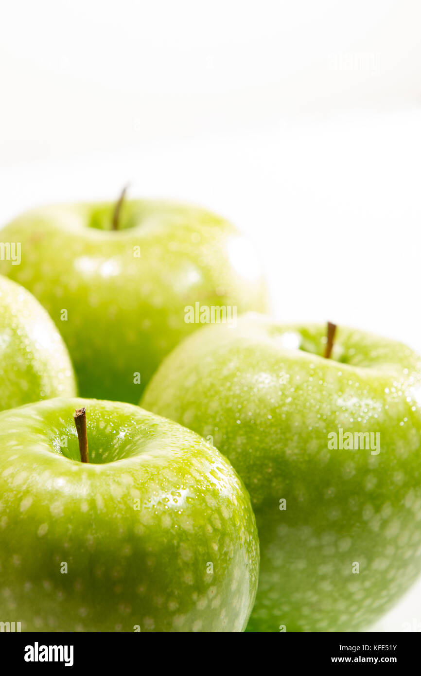 Fresh granny smith apples on a white background Stock Photo Alamy