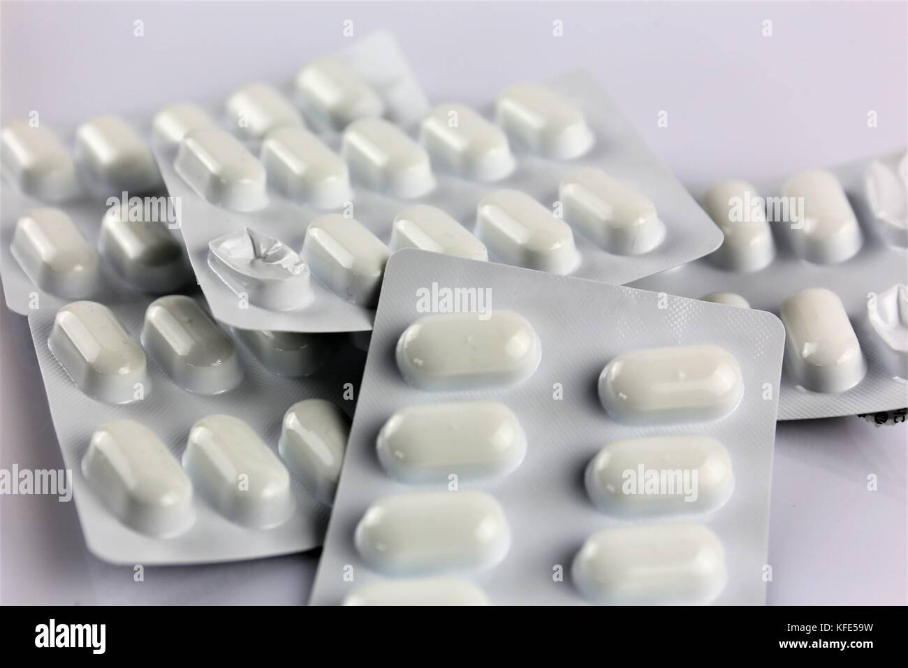 Profane Tablets Concept image tablets abuse hi-res stock photography and images - Alamy