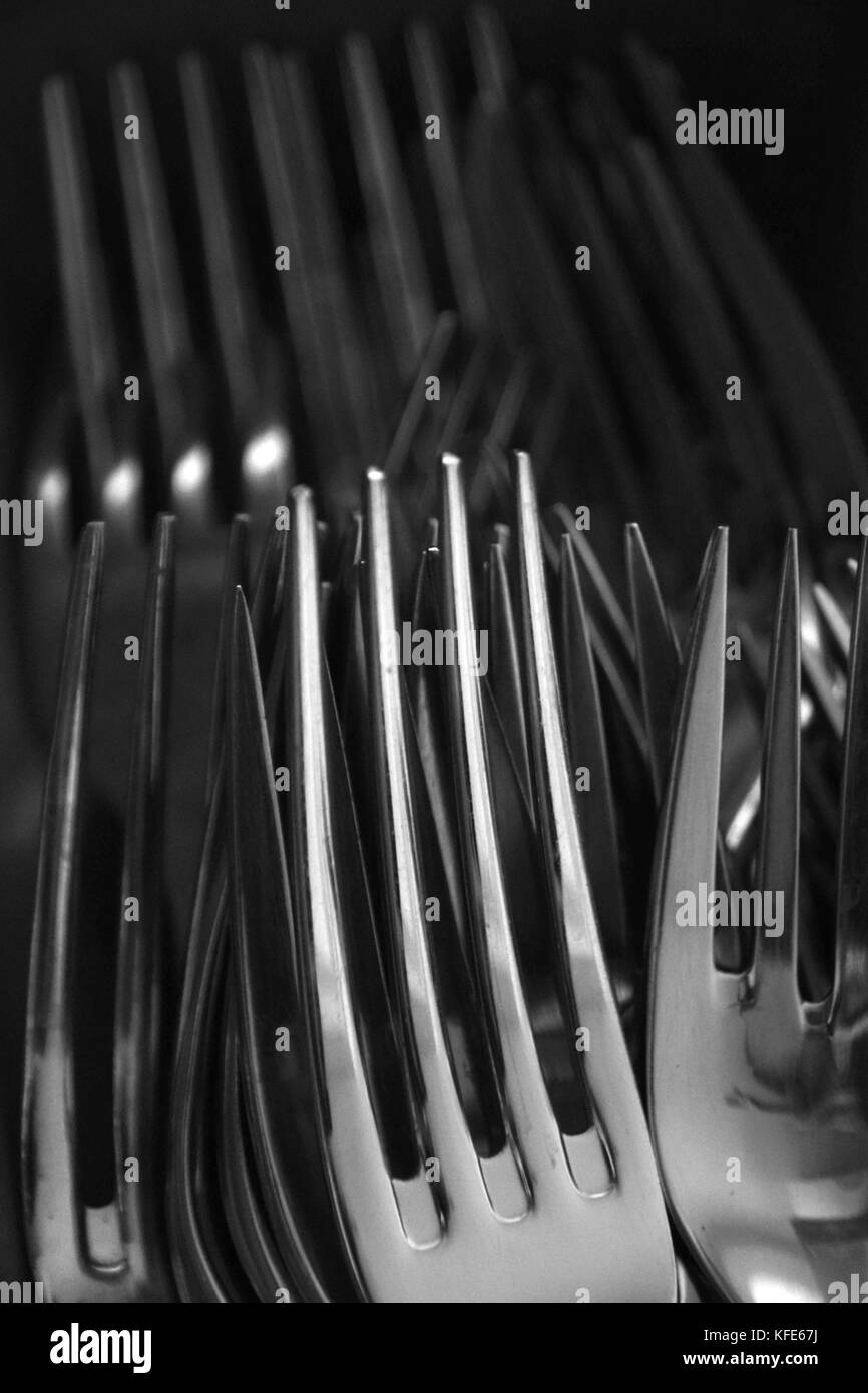 forks in black and white, abstract stacked forks in a cutlery rack