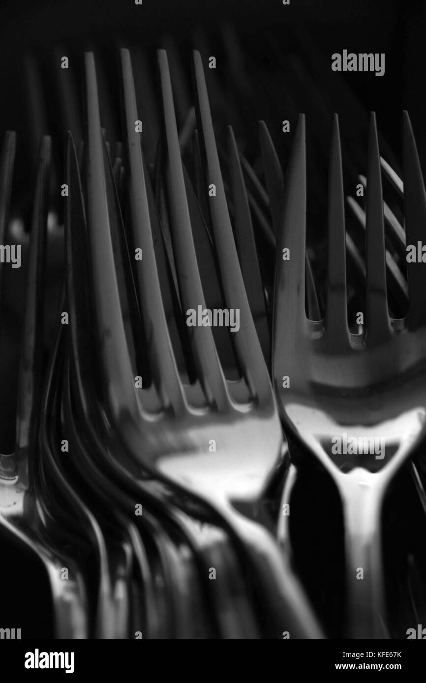 forks in black and white, abstract stacked forks in a cutlery rack Stock Photo Alamy