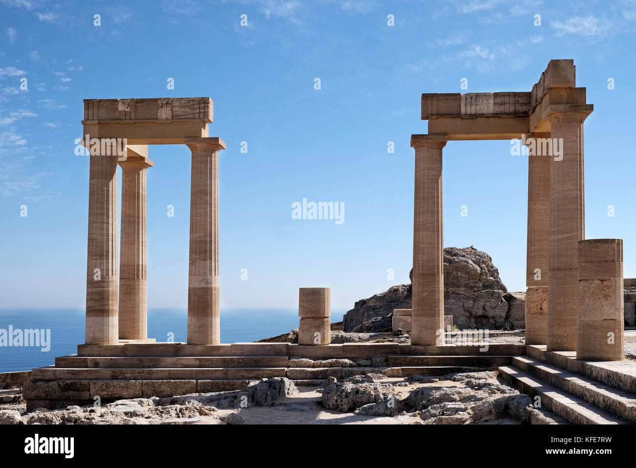 The Historic Doric Temple of Athena Lindia inside the ruins of the acropolis at Lindos on the Greek island of rhodes Stock Photo