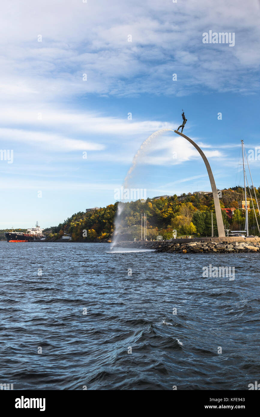 Fountain and statue of God the Father on a rainbow, Nacka Strand, Stockholm archipelago, Sweden Stock Photo