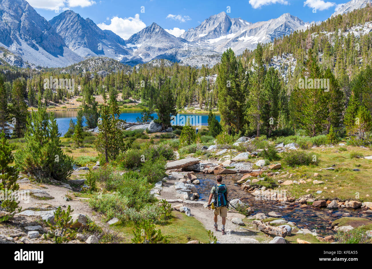 Hiker in Little Lakes Valley in Rock Creek Canyon in the Eastern Sierra in California Stock Photo