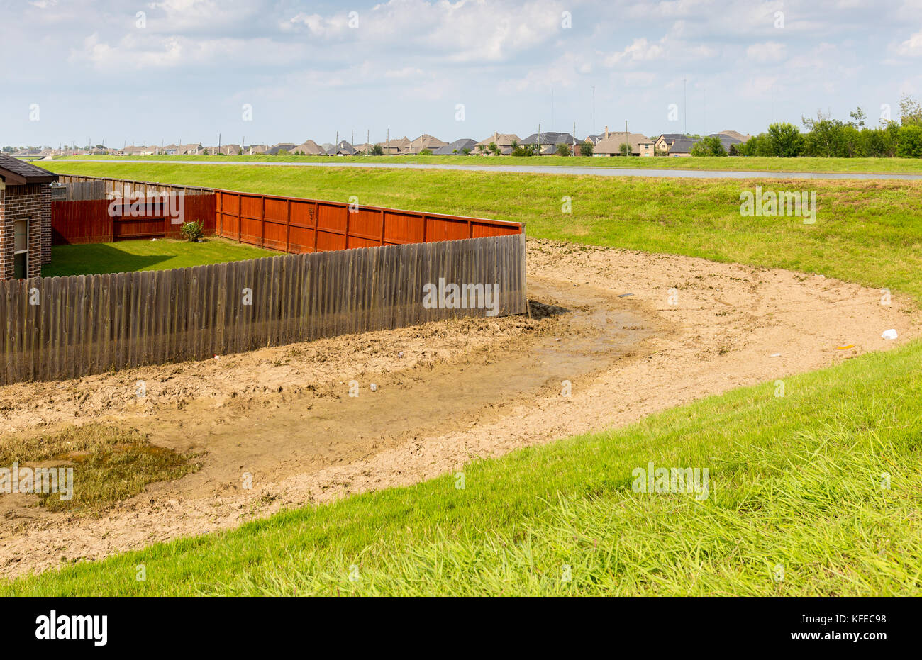 Receding flood waters leave behind mud, debris and toxic sludge Stock Photo Alamy