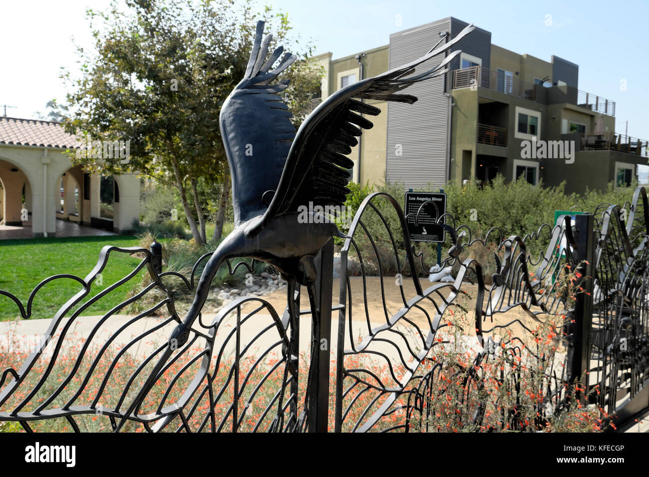 Decorative iron fence with heron in Marsh Park by new River House development Frogtown in Elysian Valley NE Los Angeles California USA  KATHY DEWITT Stock Photo