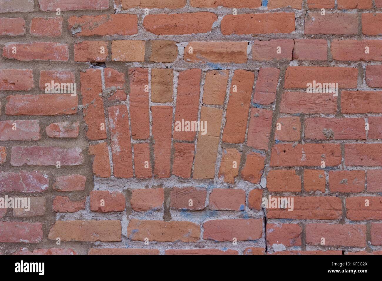 Shabby Chic Old Clay Brick Wall Background with Weathered Look Stock