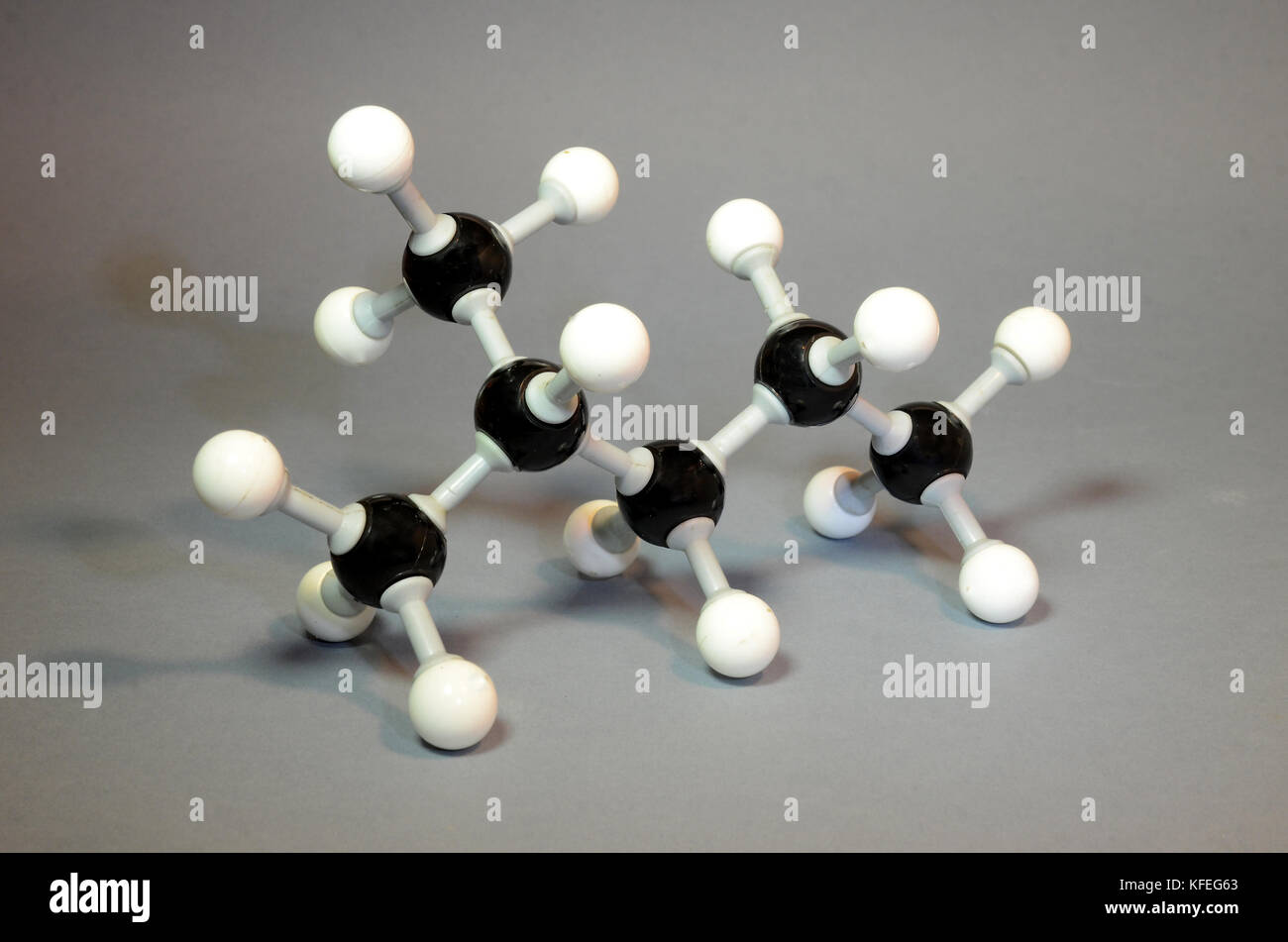 Molecule model of Pentane ('isohexane') with a single CH3 branched chain on the second carbon atom. Stock Photo