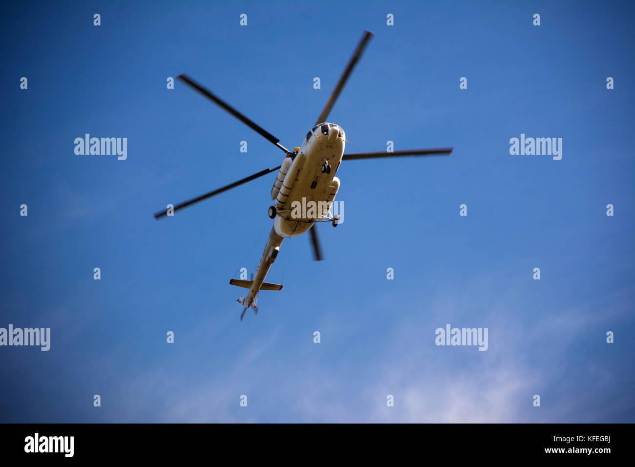 Passenger russian helicopter MI-8 fly in sky Stock Photo - Alamy