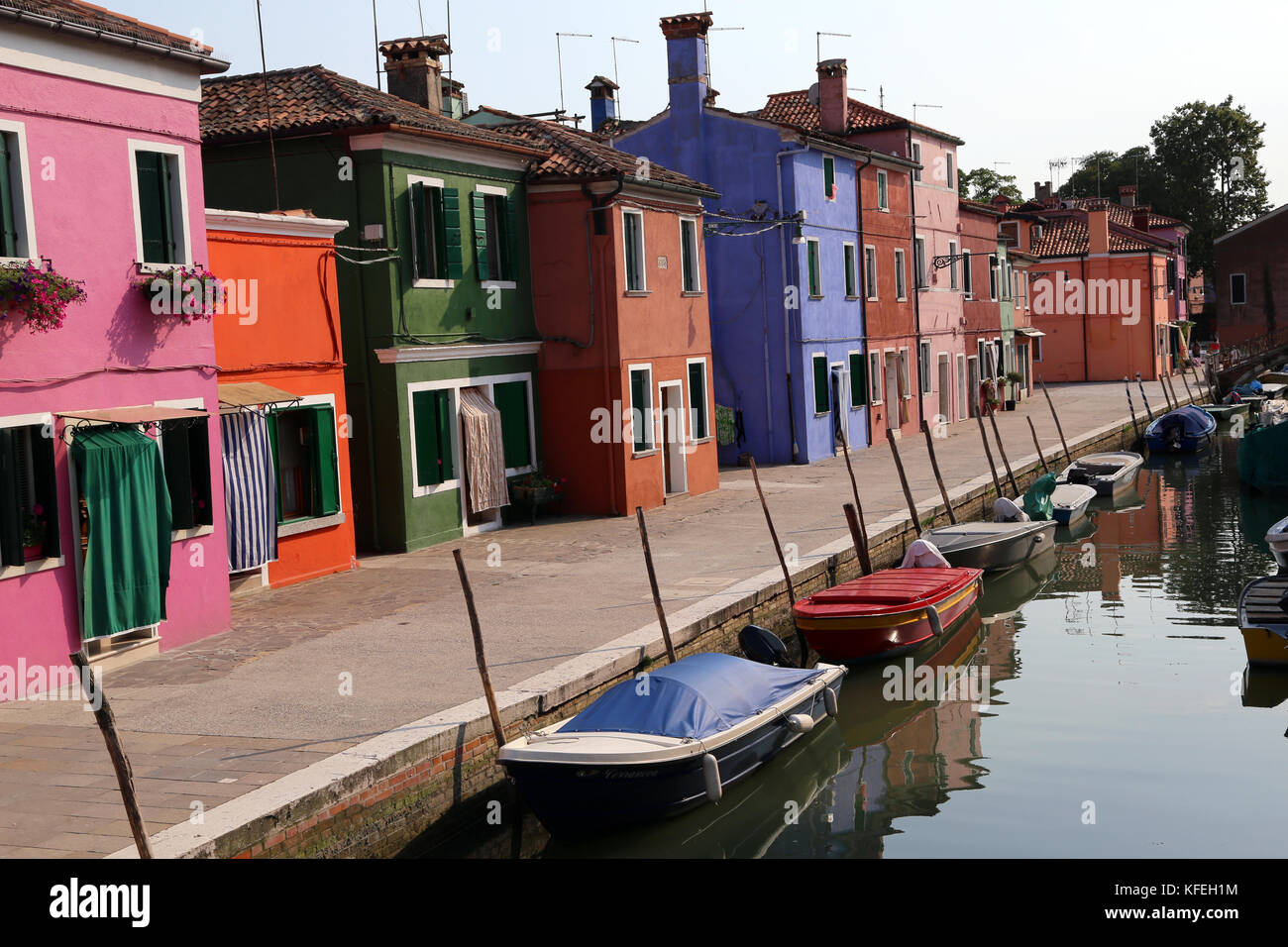 the navigable canal and the colorful houses of the BURANO island near Venice in Northern Italy Stock Photo