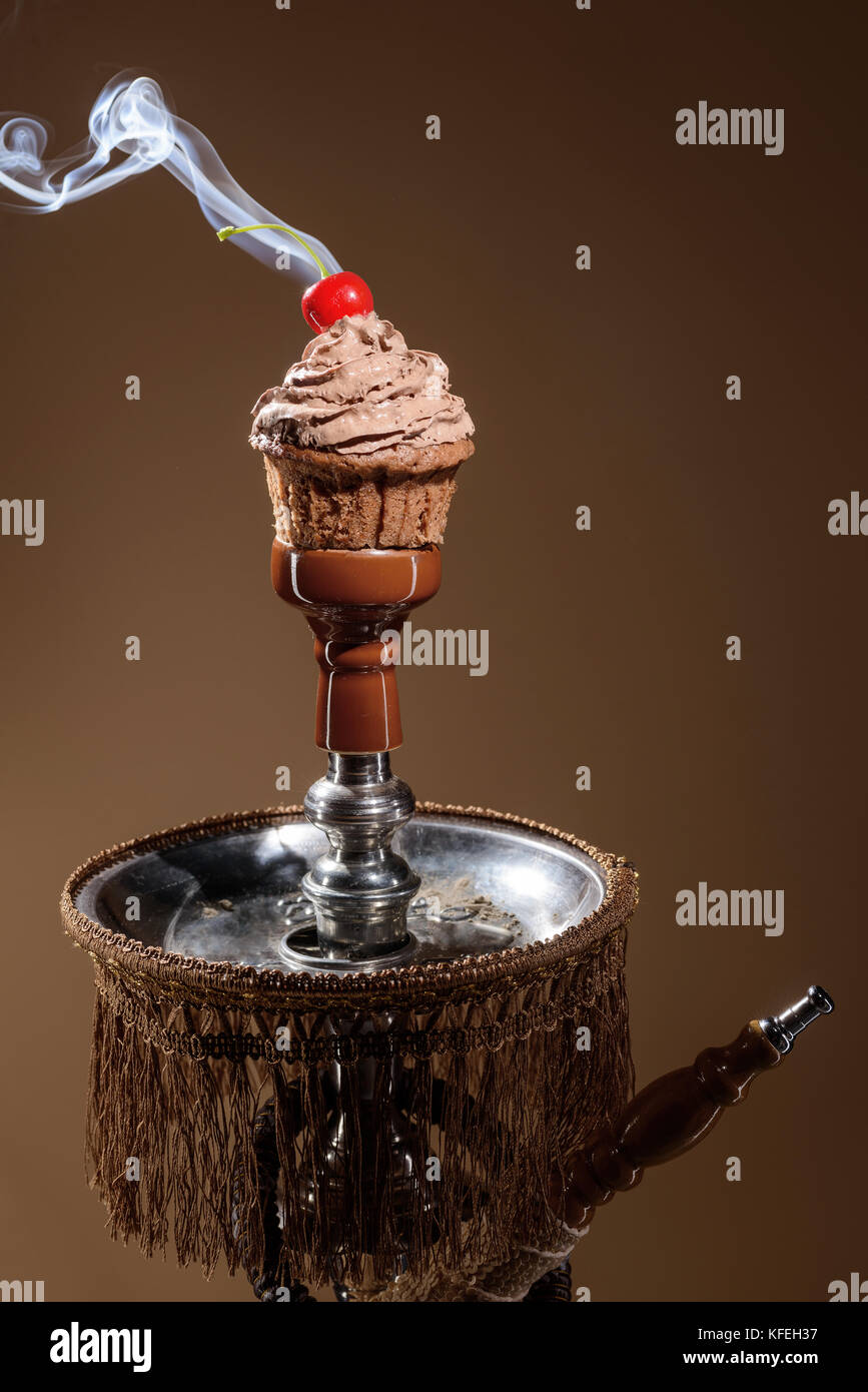 Smoking hookah with fruit head on dark background Stock Photo Alamy