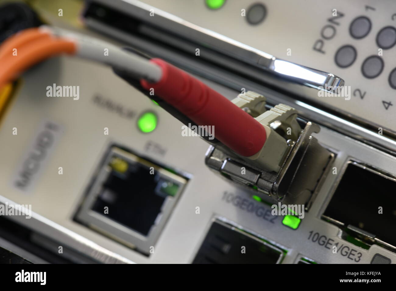 Optical Fibre Patch Cords Connected to Passive Line Unit, Information Technology in Internet of Things Devices Stock Photo