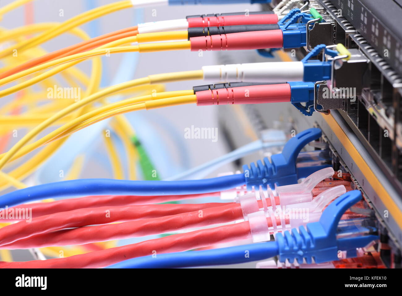 Fiber optic and network patch cord cables in data center Stock Photo