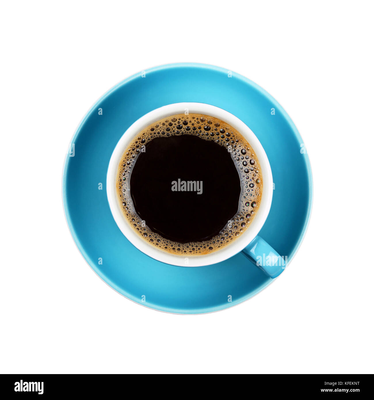 Full cup of black Americano or instant coffee on blue saucer isolated on white background, close up, elevated top view Stock Photo