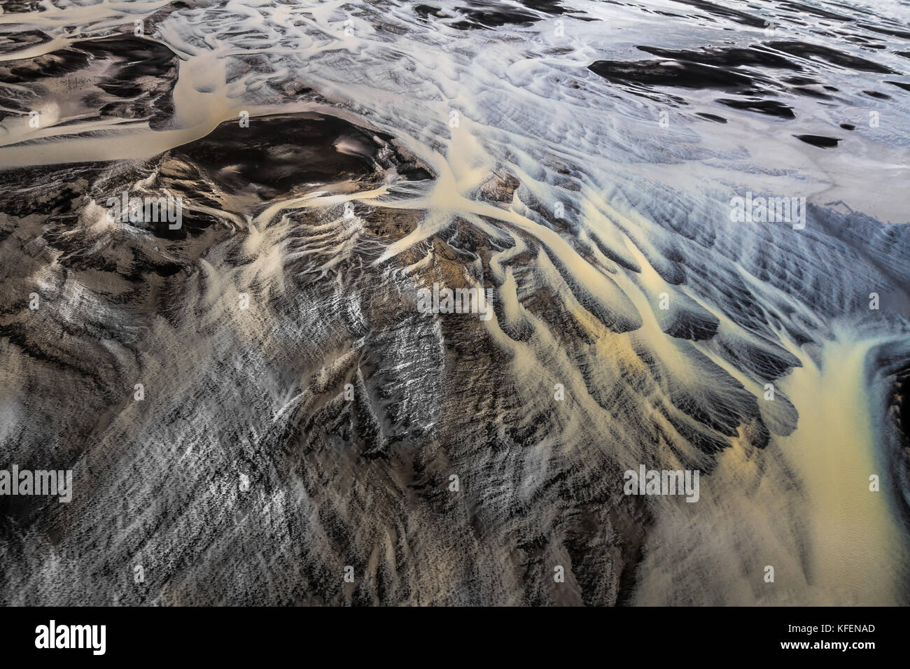 River Shapes in the Black Sand Stock Photo