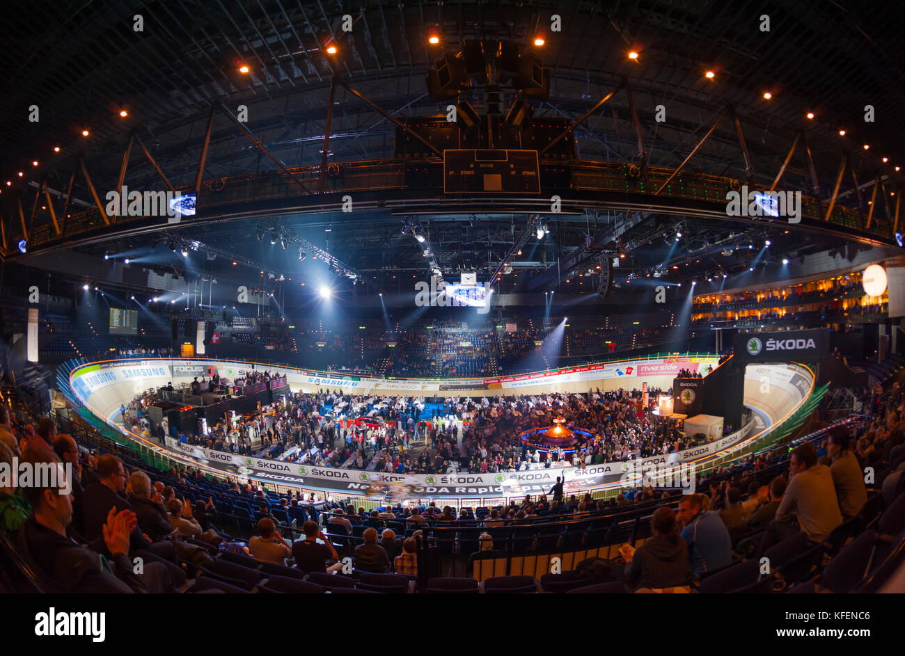 Zurich, Switzerland - 28 Nov 2013: A 200m wooden bicycle race track is built into Zurich's packed Hallenstadion to host the 2013 six day cycle race. (distortion from fisheye lens) Stock Photo