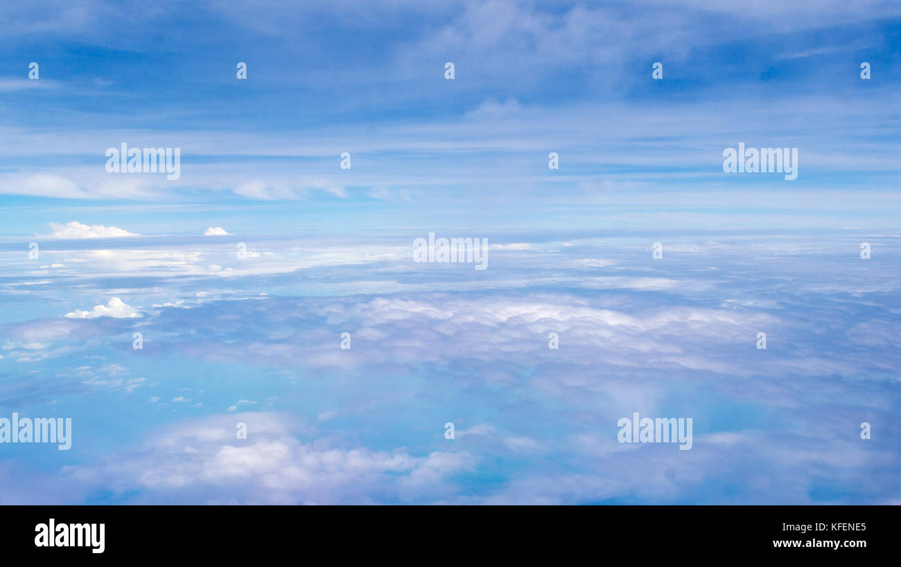 blue sky and white cloud formation looked from airplane window Stock ...