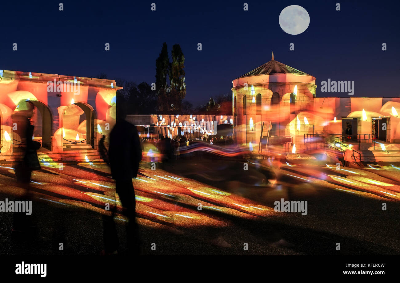 All Saints Day light show at the Budapest Farkasret Cemetery. Stock Photo