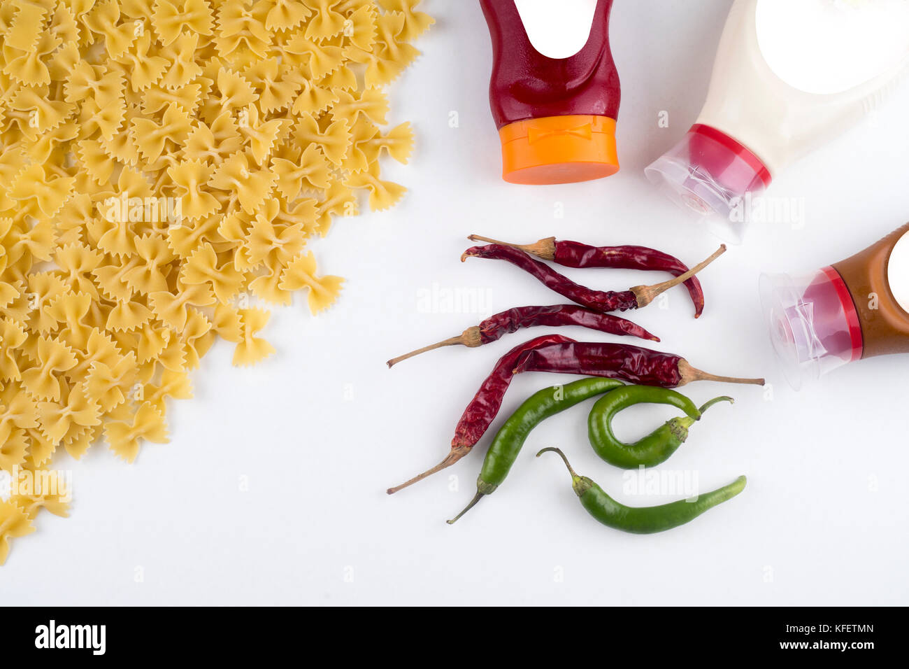spaghetti with ketchup mayonnaise on white background Stock Photo Alamy