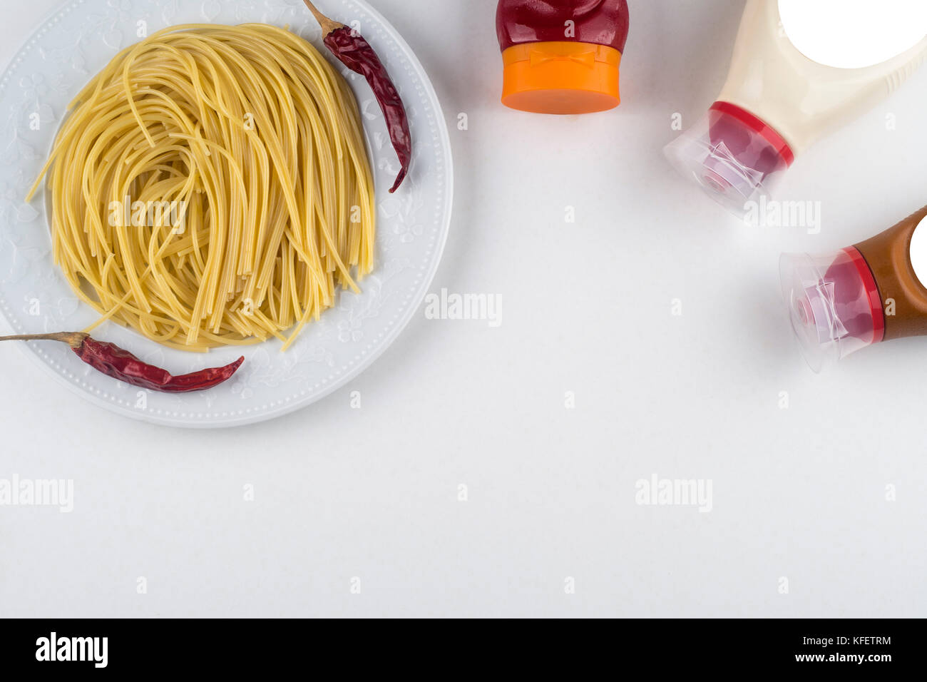 spaghetti with ketchup mayonnaise on white background Stock Photo Alamy