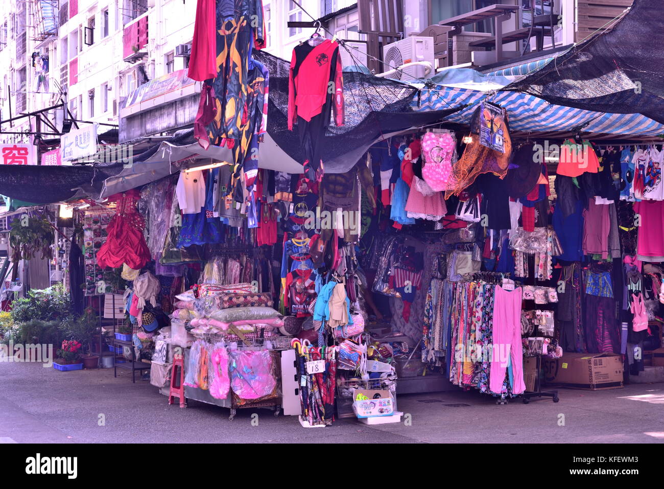 Apparel stall at a street corner of Tai Po Market, Hong Kong. Stock Photo